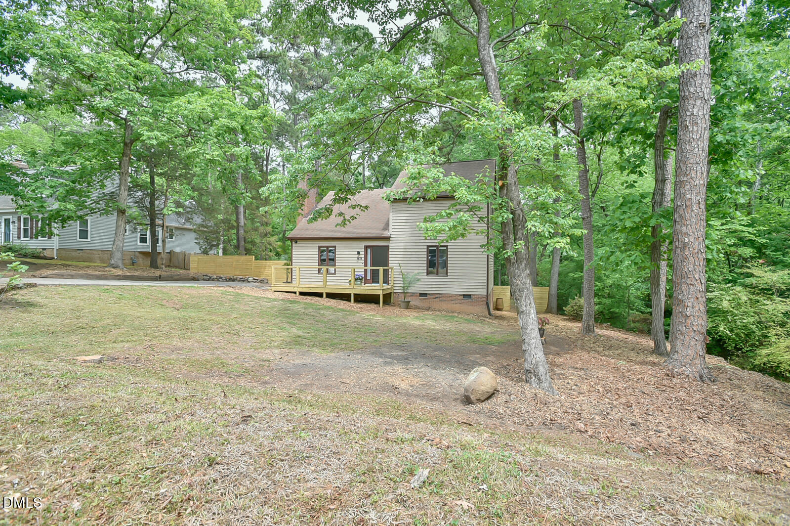 1626 Rowemont Drive Durham, NC 27705 - Photo 31 of 45 a view of a house with backyard and a trees