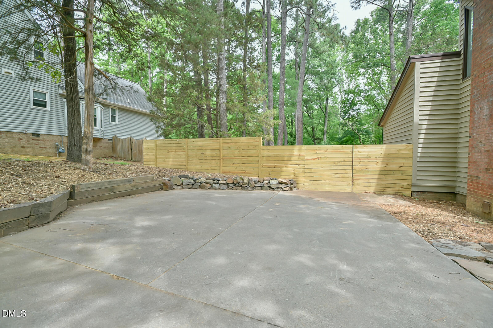 1626 Rowemont Drive Durham, NC 27705 - Photo 32 of 45 a view of backyard and trees