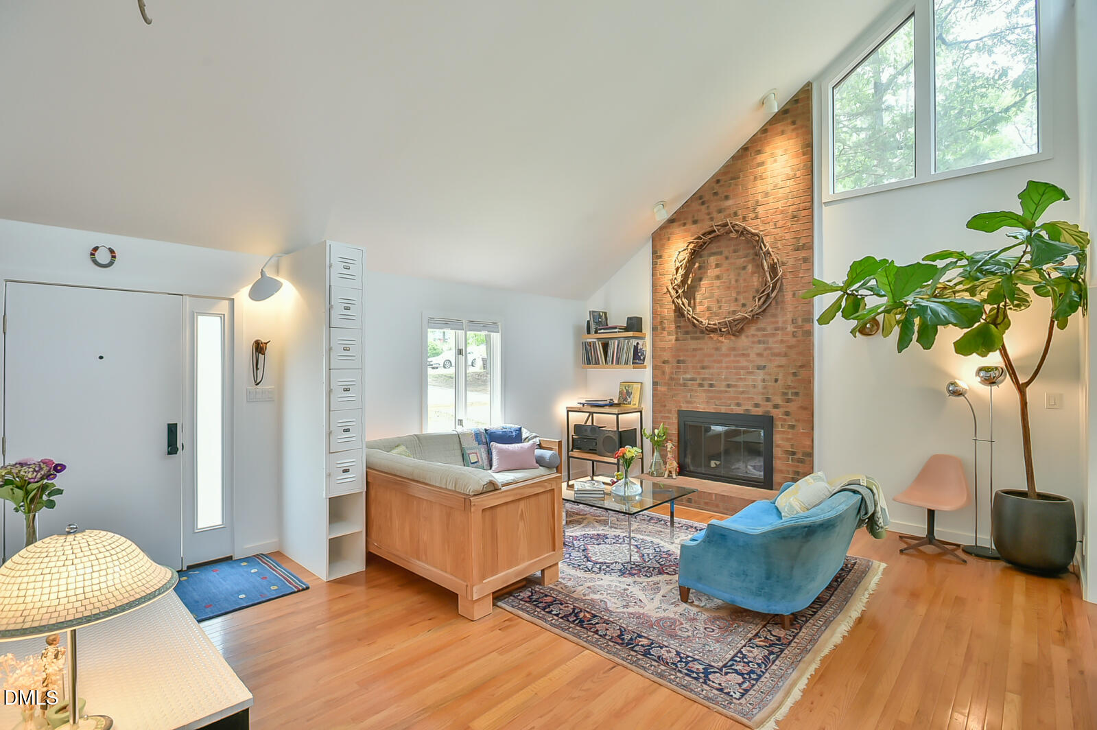 1626 Rowemont Drive Durham, NC 27705 - Photo 5 of 45 a living room with fireplace furniture and a large window