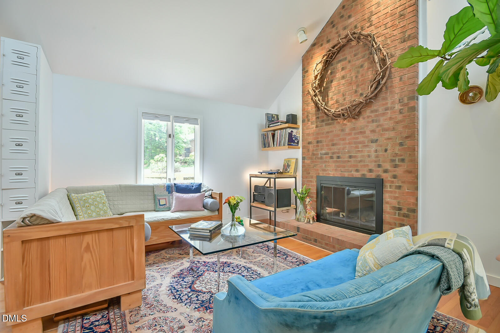 1626 Rowemont Drive Durham, NC 27705 - Photo 7 of 45 a living room with furniture and a fireplace