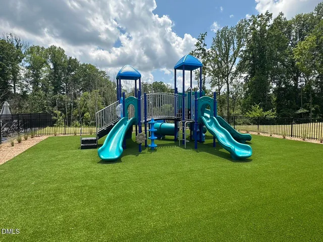 a view of a park with swings