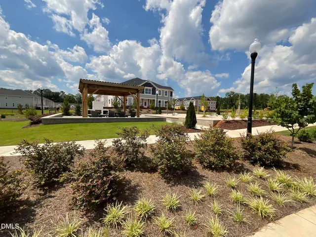 a view of a lake with a big yard