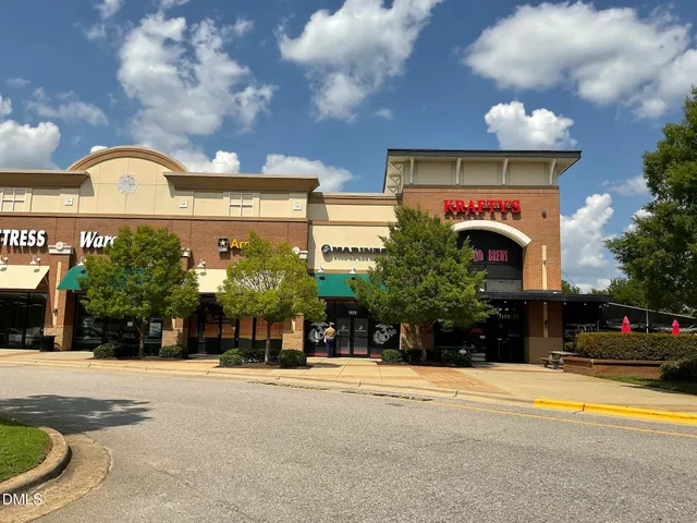 a view of a building with a street