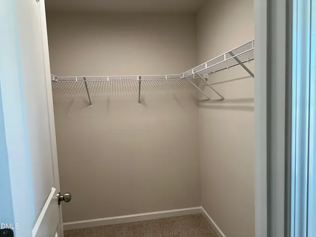 a view of small space with racks on the wall