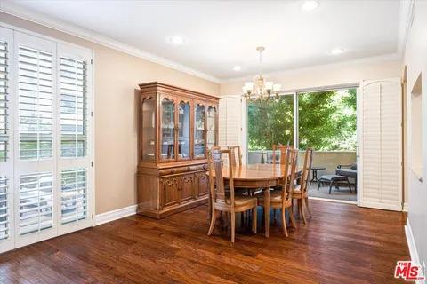 a kitchen with stainless steel appliances granite countertop a refrigerator and cabinets