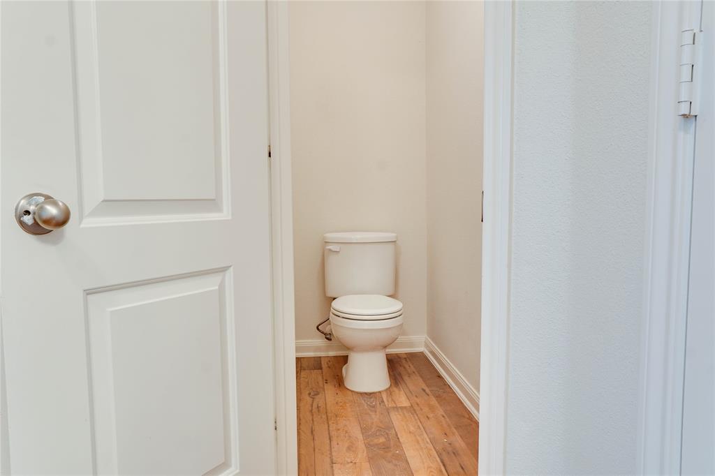 1232 Switchgrass Lane Crowley, TX 76036 - Photo 26 of 31 a bathroom with a toilet