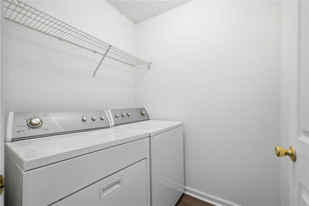2254 Caneridge Trail Southwest Marietta, GA 30064 - Photo 27 of 30 a utility room with dryer and washer