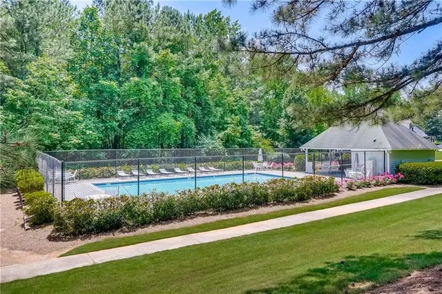 a view of backyard with green space