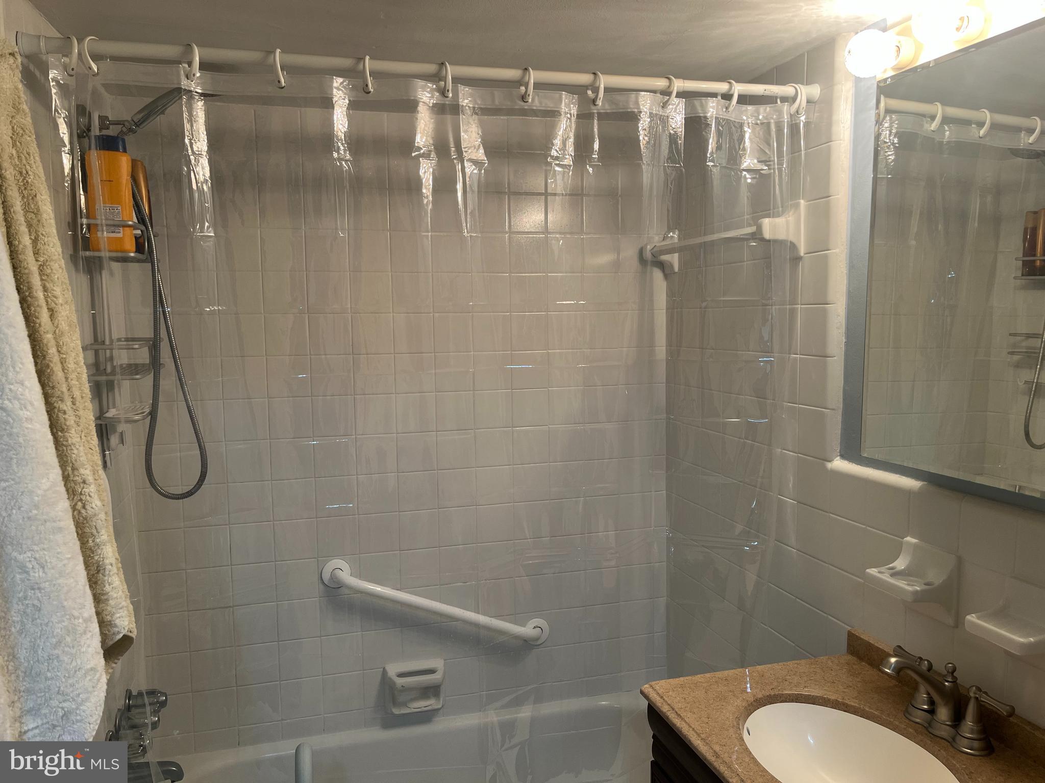 1610 The Fairway, Unit 104W Jenkintown, PA 19046 - Photo 11 of 14 a bathroom with a shower and toilet