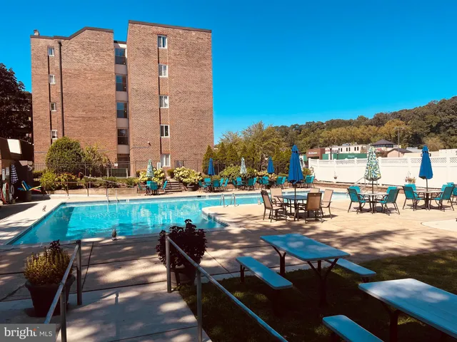 a view of a terrace with chairs and a patio