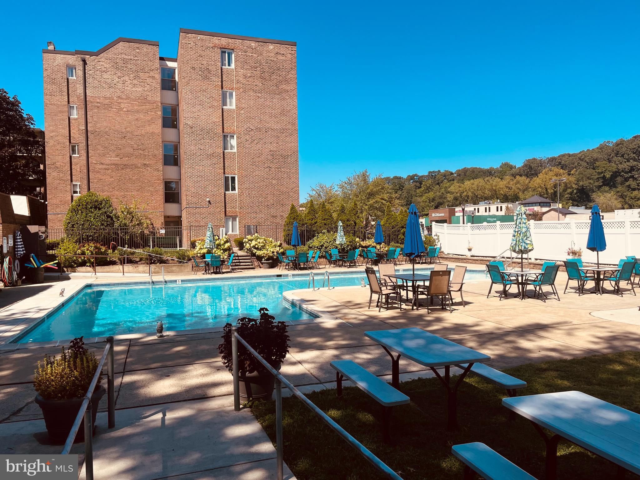 1610 The Fairway, Unit 104W Jenkintown, PA 19046 - Photo 13 of 14 a view of a terrace with chairs and a patio