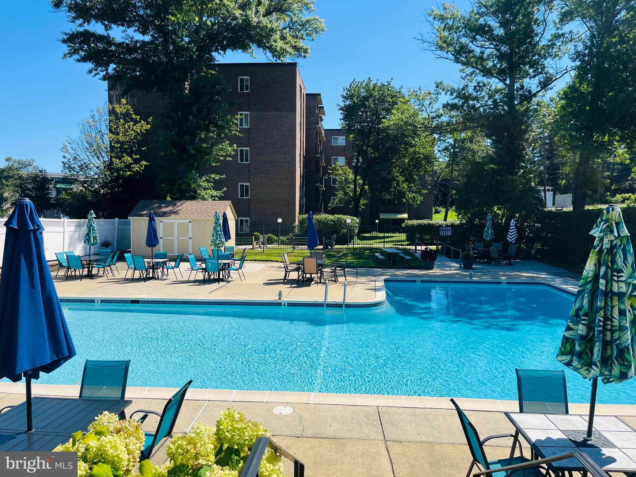 1610 The Fairway, Unit 104W Jenkintown, PA 19046 - Photo 14 of 14 a view of swimming pool with chairs