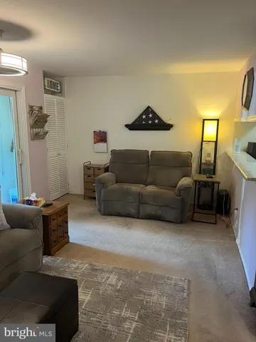 a living room with furniture and a couch