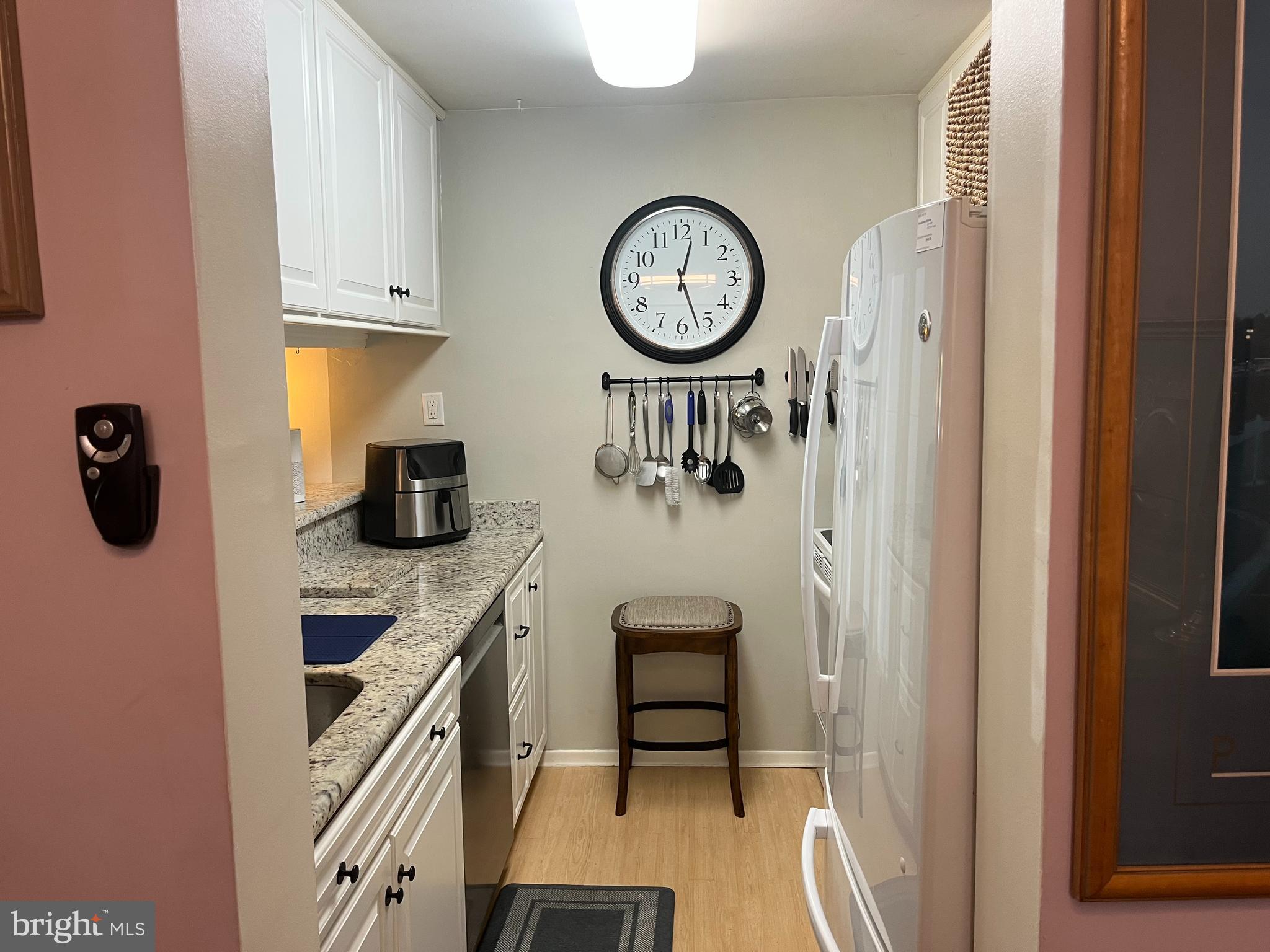 1610 The Fairway, Unit 104W Jenkintown, PA 19046 - Photo 5 of 14 a view of a hallway with washer and dryer