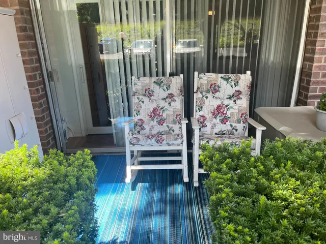 a view of outdoor space with deck and furniture