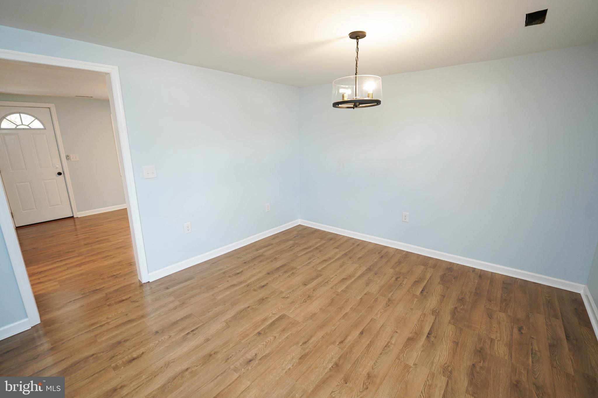 31872 Flower Hill Church Road Eden, MD 21822 - Photo 13 of 28 a view of empty room with wooden floor