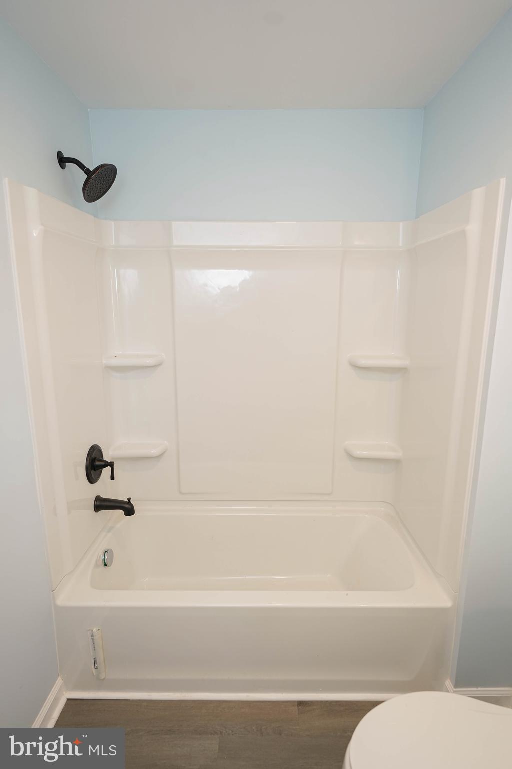 31872 Flower Hill Church Road Eden, MD 21822 - Photo 19 of 28 a bathroom with a bathtub and a shower