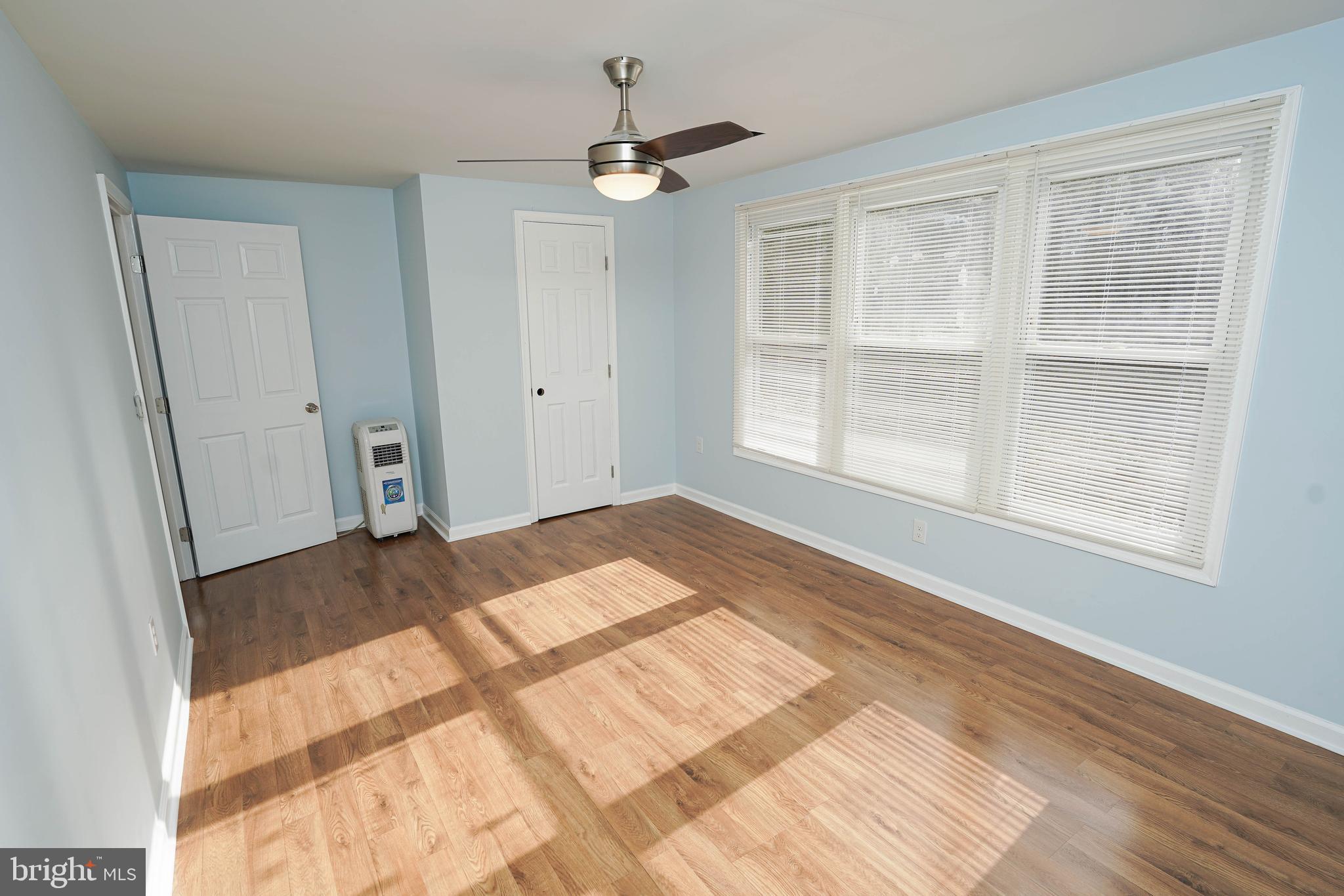 31872 Flower Hill Church Road Eden, MD 21822 - Photo 23 of 28 a view of a livingroom with a ceiling fan and window