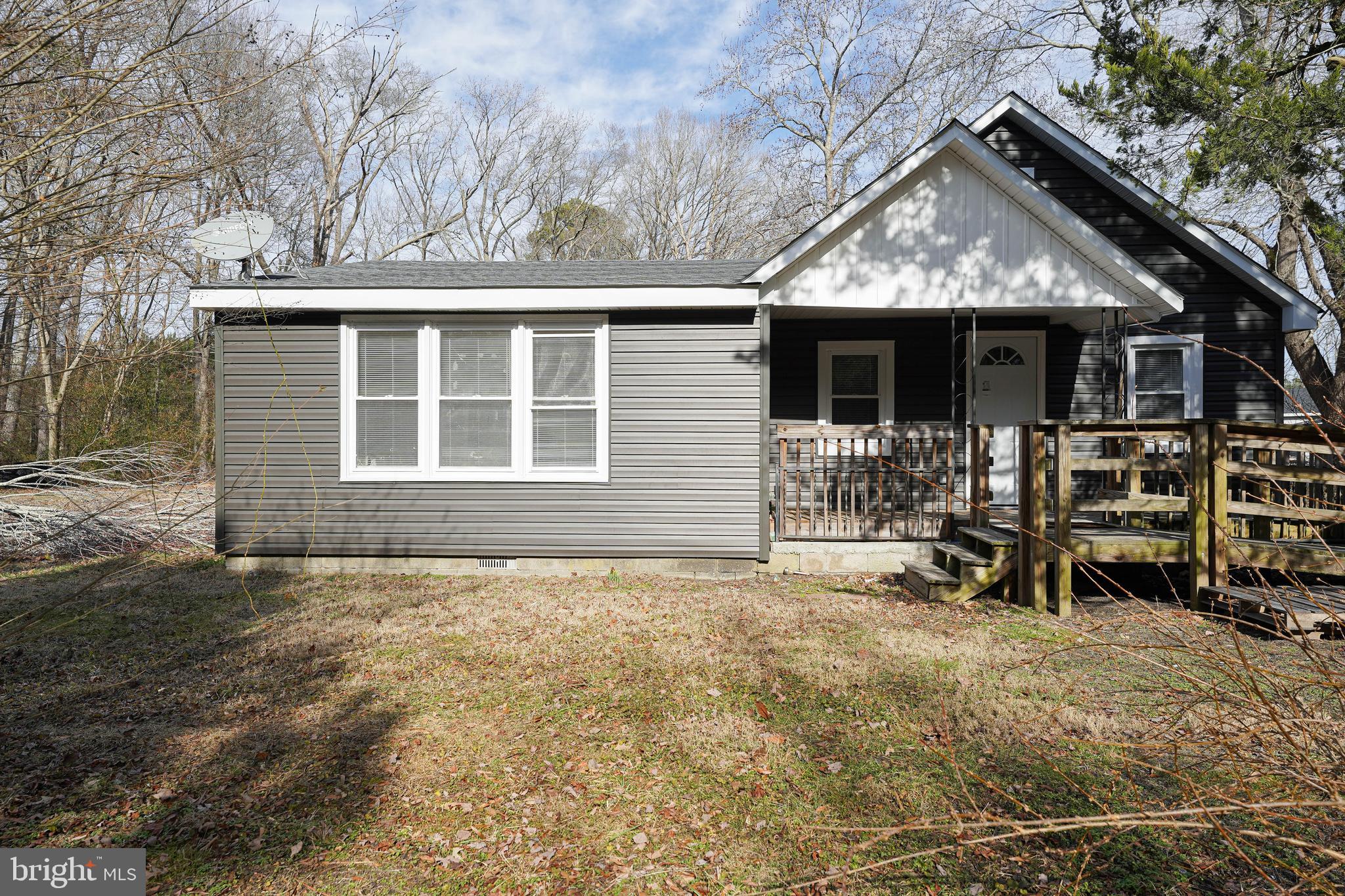 31872 Flower Hill Church Road Eden, MD 21822 - Photo 28 of 28 a backyard of a house with barbeque oven and table