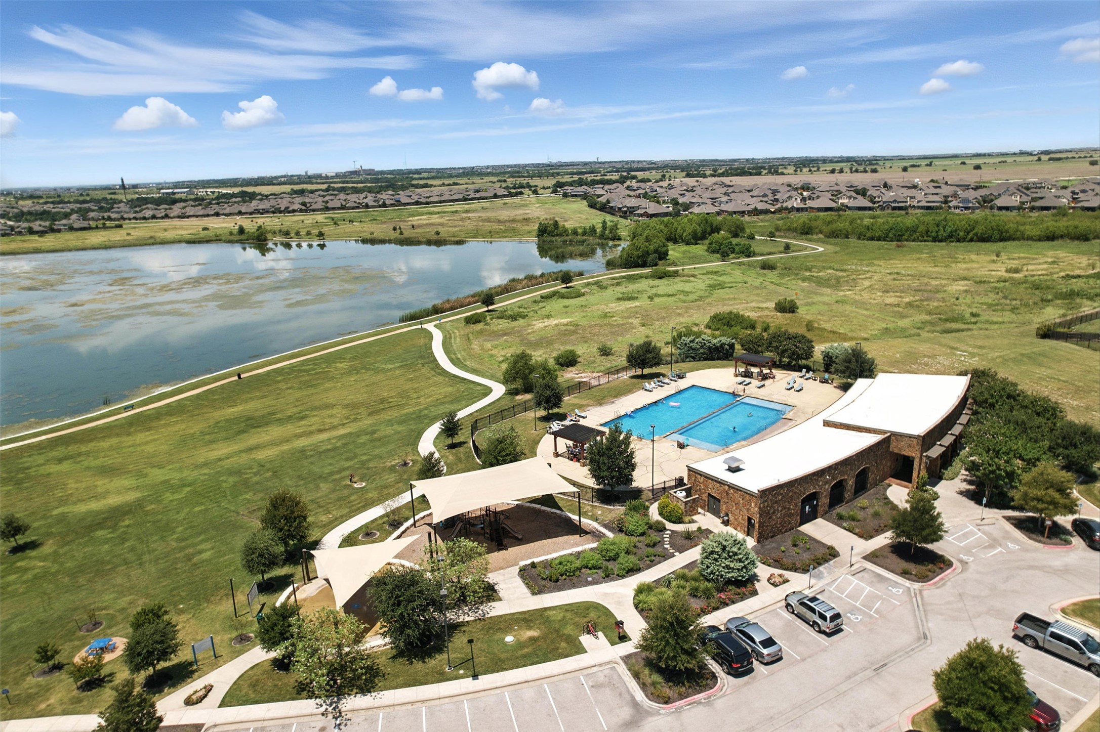 3054 Columbus Loop Round Rock, TX 78665 - Photo 31 of 40 Aerial view of a pool area and a large body of water