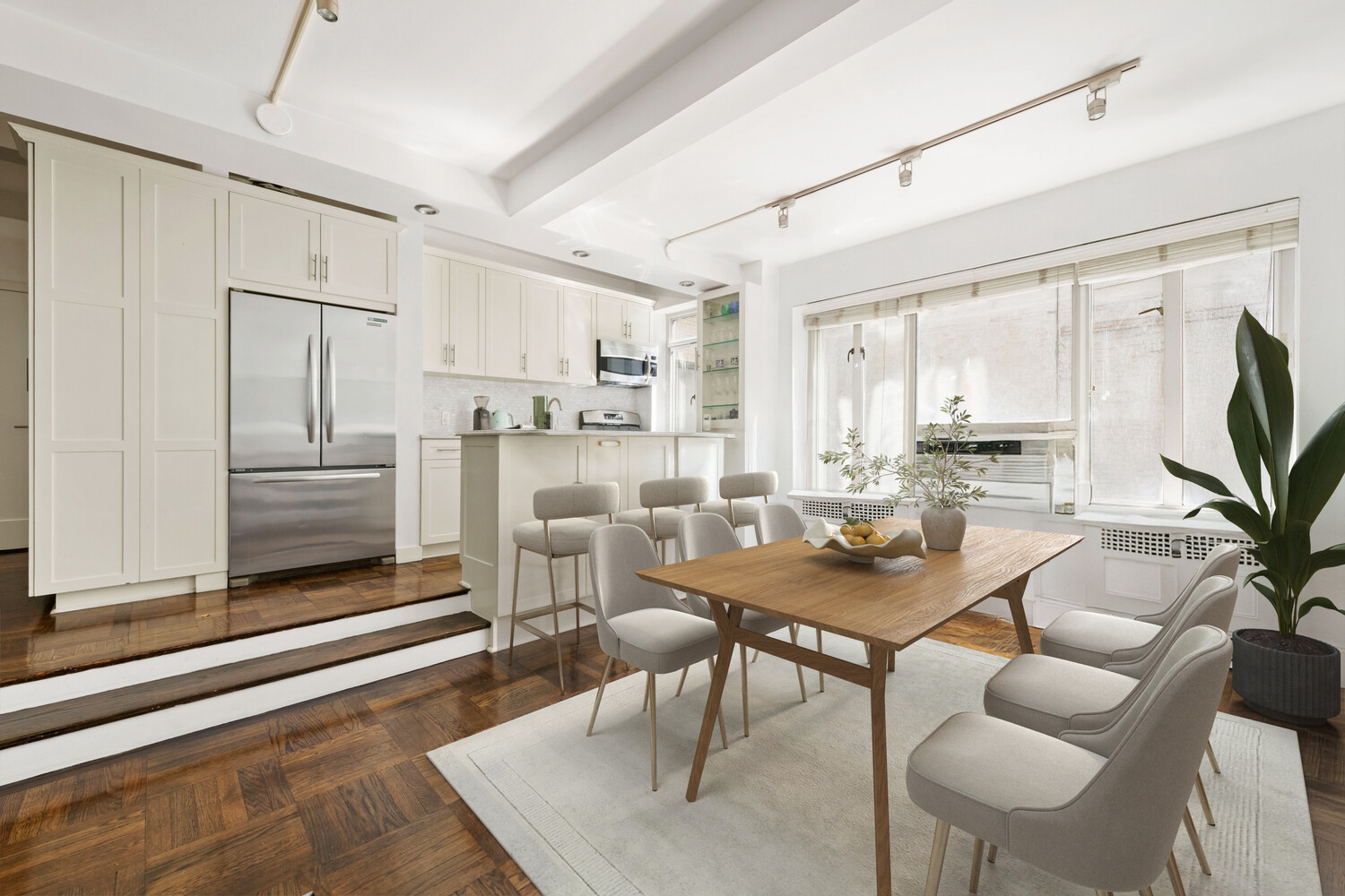 20 East 35th Street, Unit 2E Manhattan, NY 10035 - Photo 2 of 10 a dining room with furniture and a window