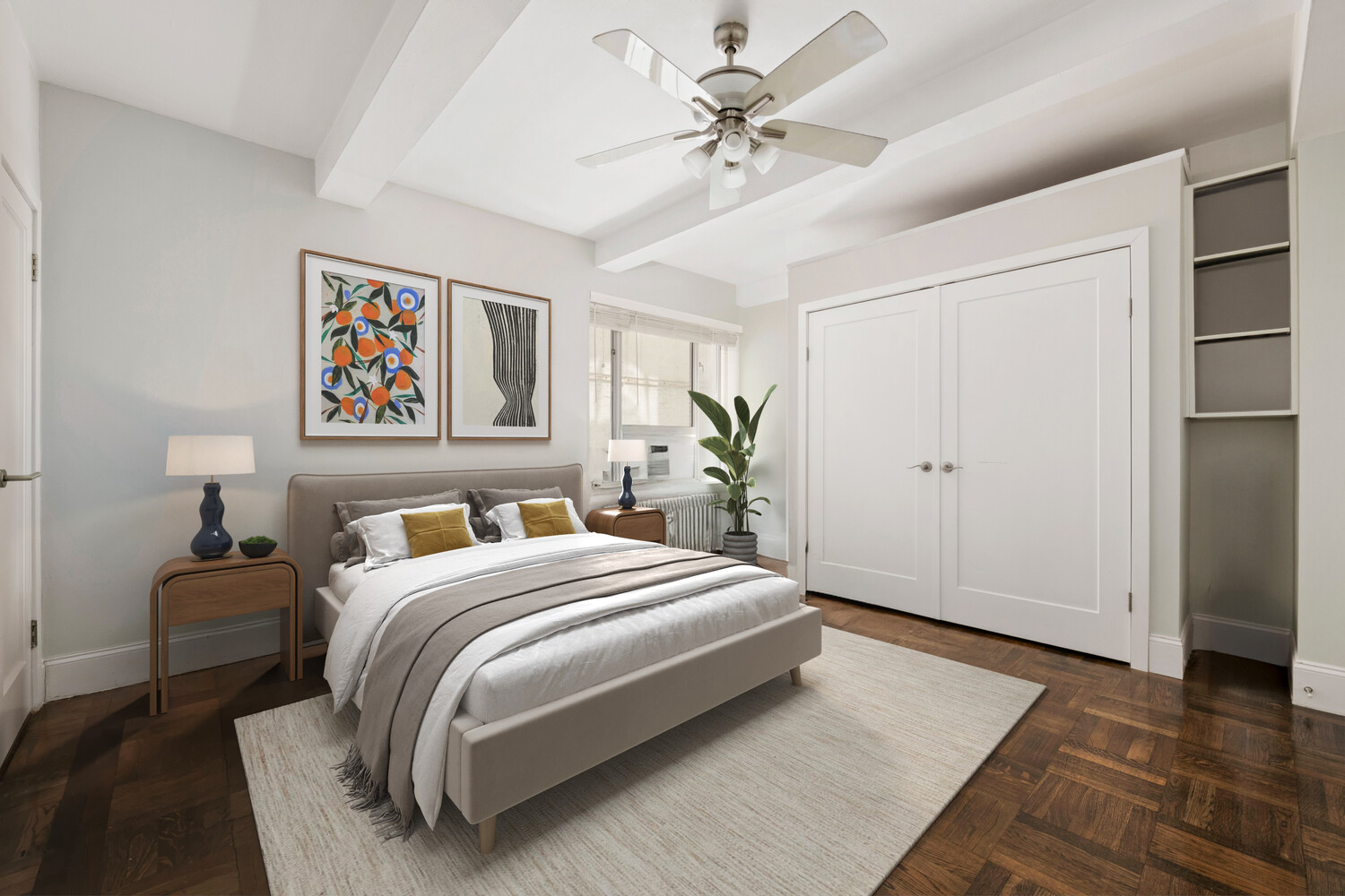 20 East 35th Street, Unit 2E Manhattan, NY 10035 - Photo 4 of 10 a bedroom with a bed and a chandelier