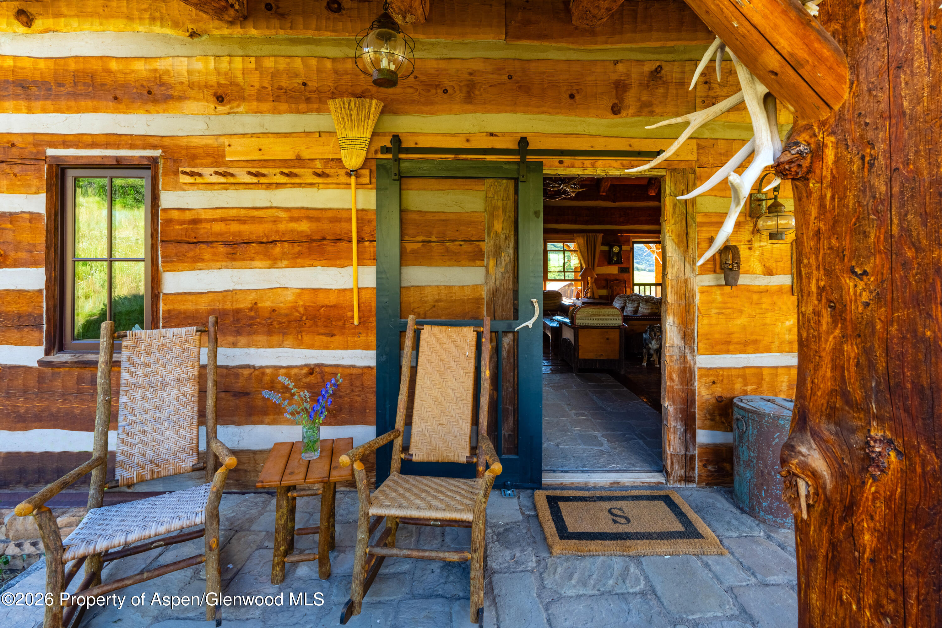1350 Old Herron Road Basalt, CO 81621 - Photo 43 of 81 a view of living room with patio furniture and floor to ceiling window