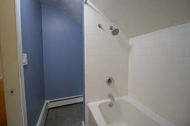 a bathroom with a bathtub