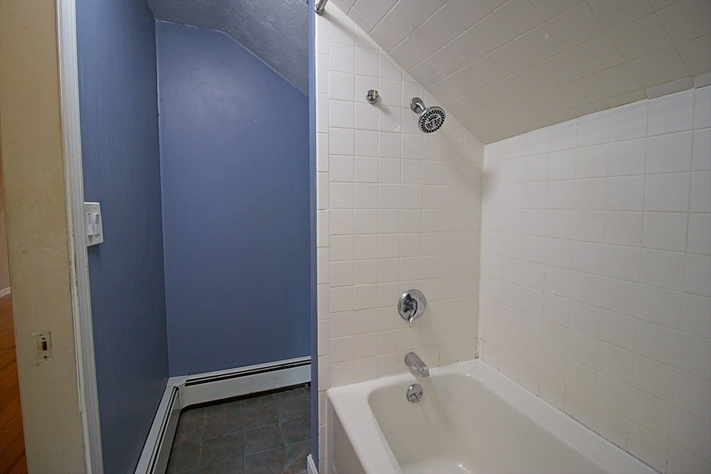 45 Depot Street, Unit 2 Sharon, MA 02067 - Photo 10 of 12 a bathroom with a bathtub