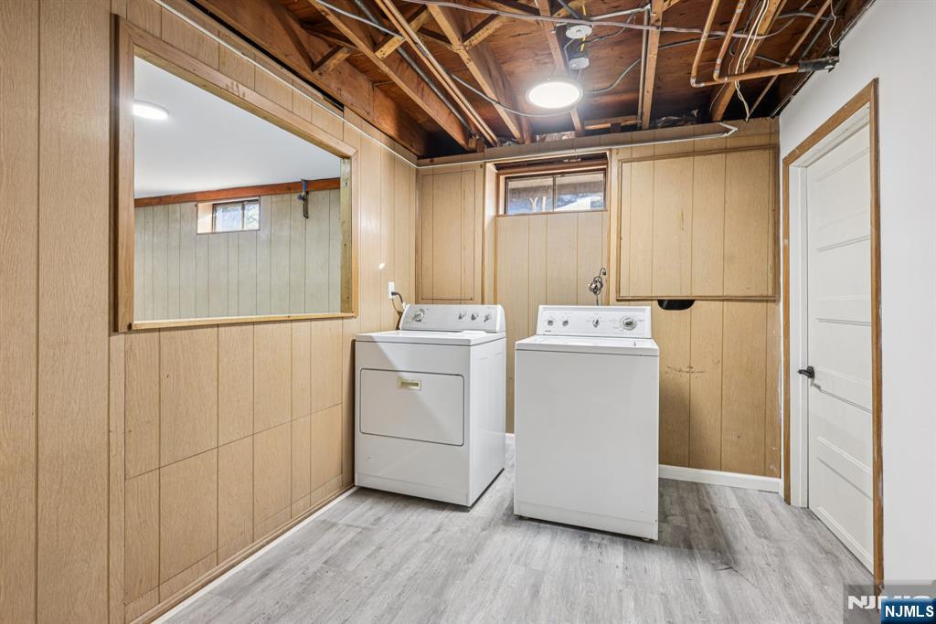 217 Knickerbocker Road Closter, NJ 07624 - Photo 23 of 27 a utility room with dryer and washer