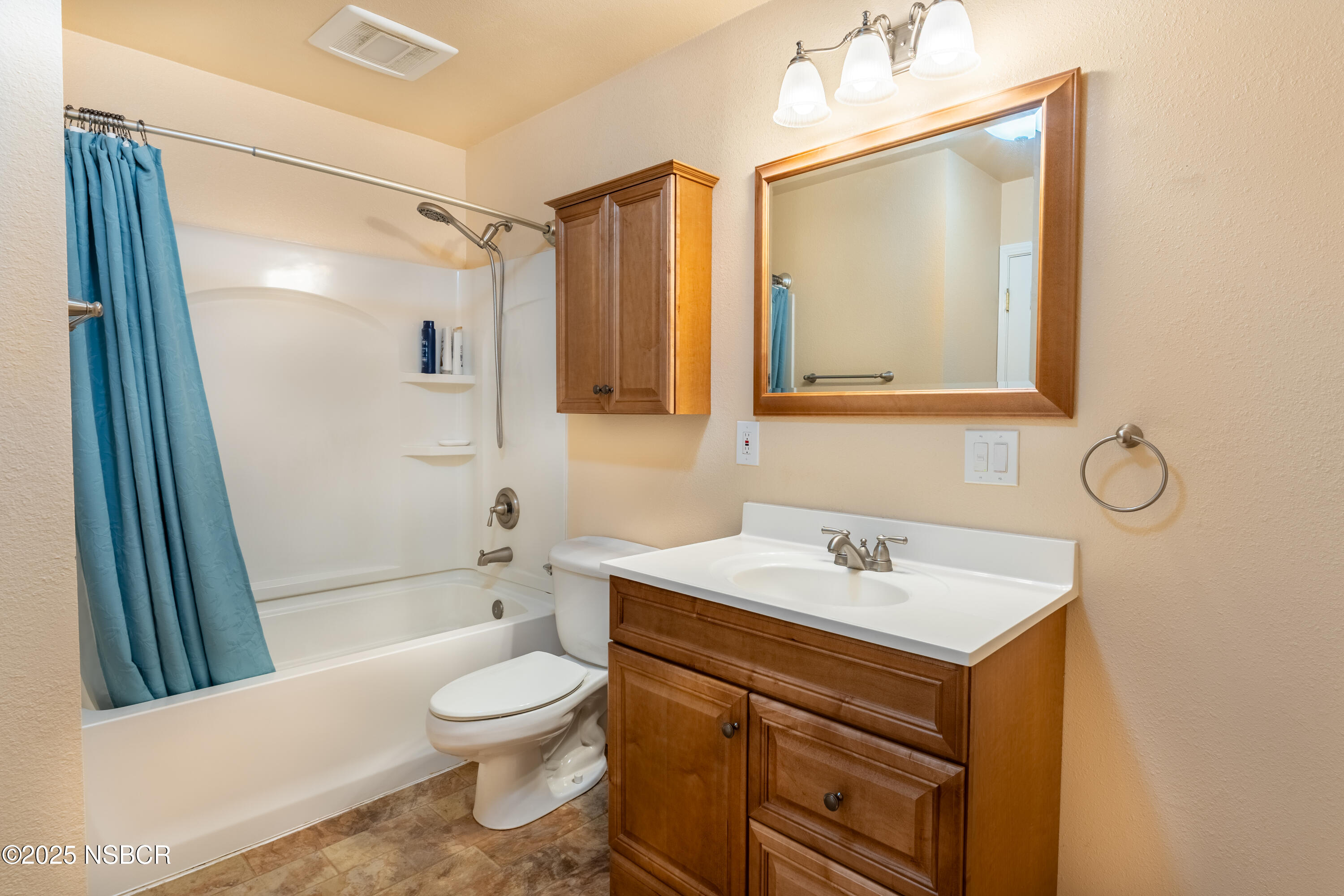 901 Arnold Avenue Lompoc, CA 93436 - Photo 11 of 21 a bathroom with a sink a toilet and shower
