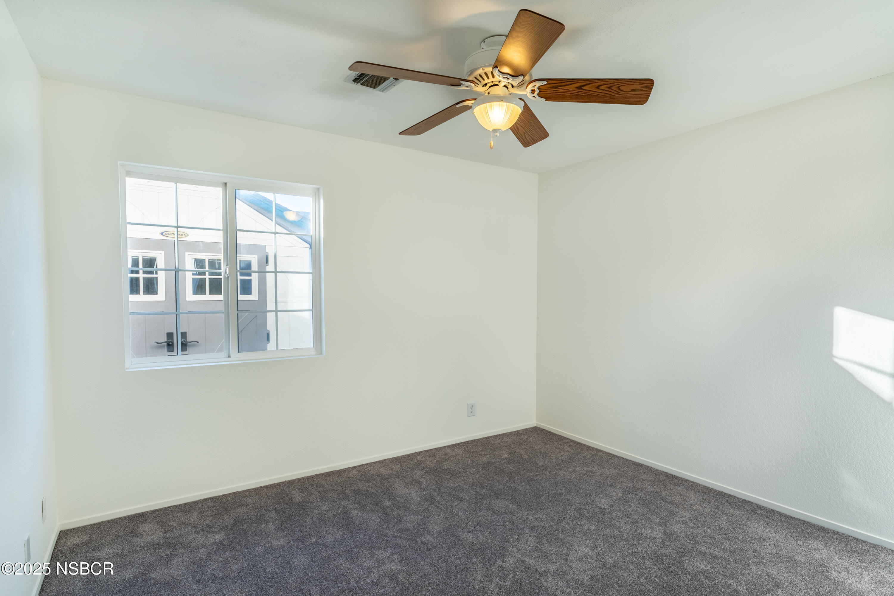 901 Arnold Avenue Lompoc, CA 93436 - Photo 18 of 21 an empty room with a window