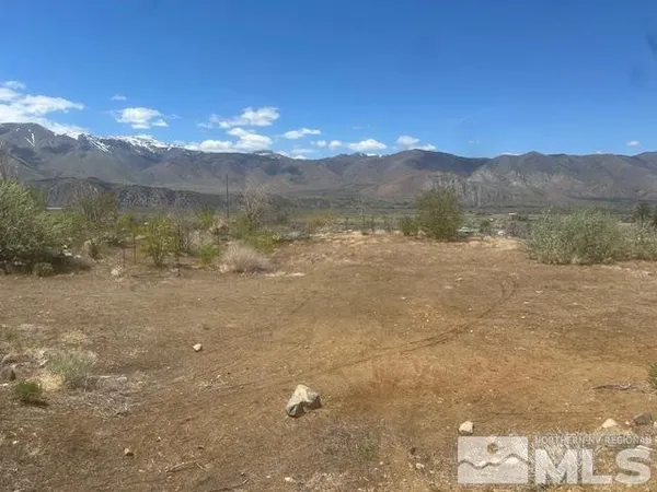 a view of a lake in middle of the town