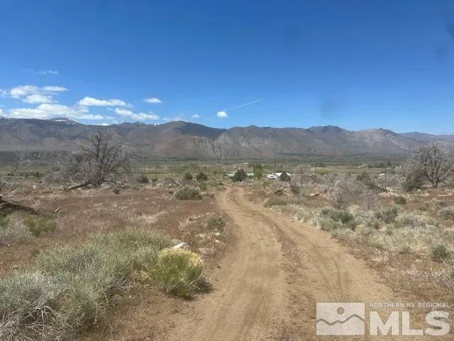 a view of mountain with lake view