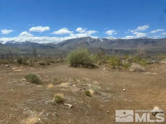 a view of a lake with a mountain