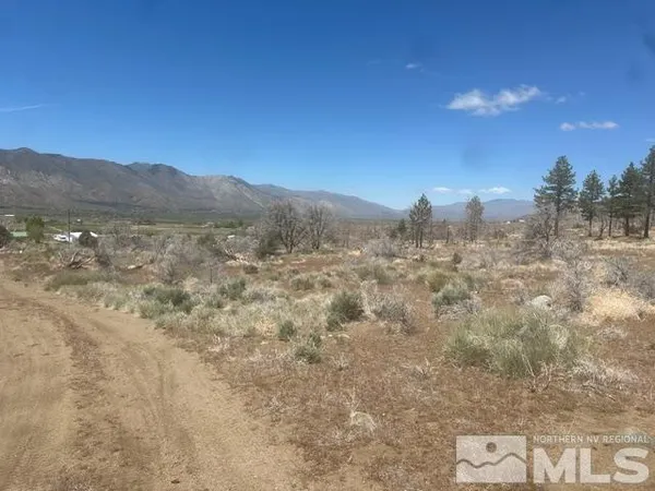 a view of a lake with a mountain in the background