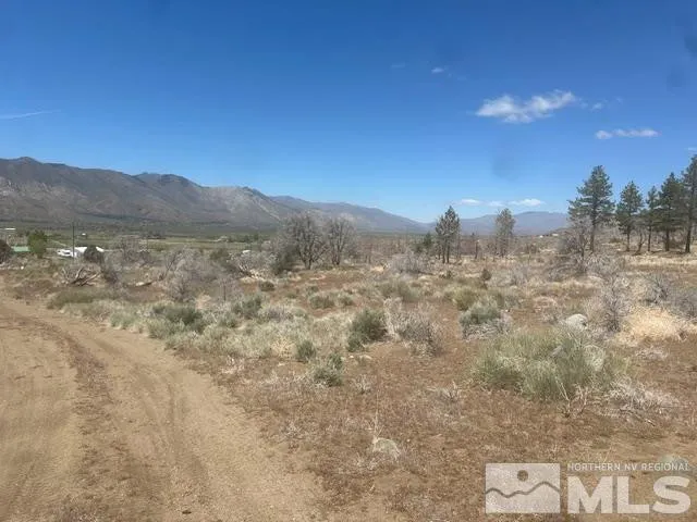 a view of a lake with a mountain in the background