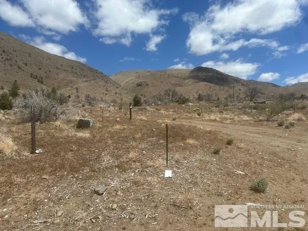 a view of lake with mountain