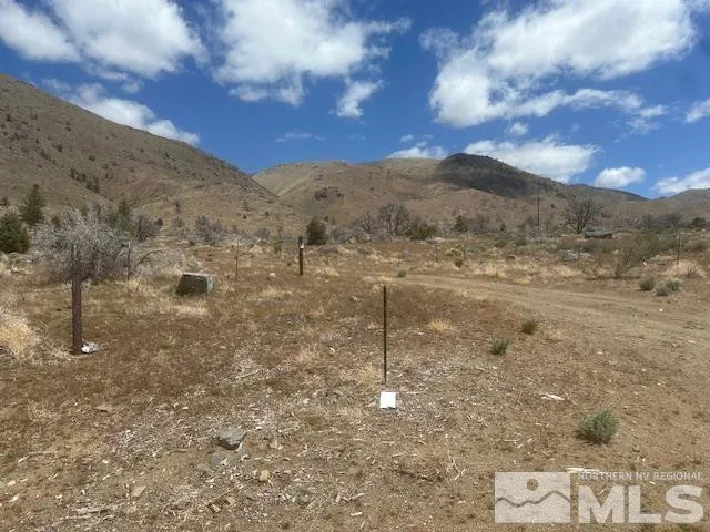 a view of lake with mountain