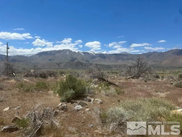 a view of mountain view with mountains in the background