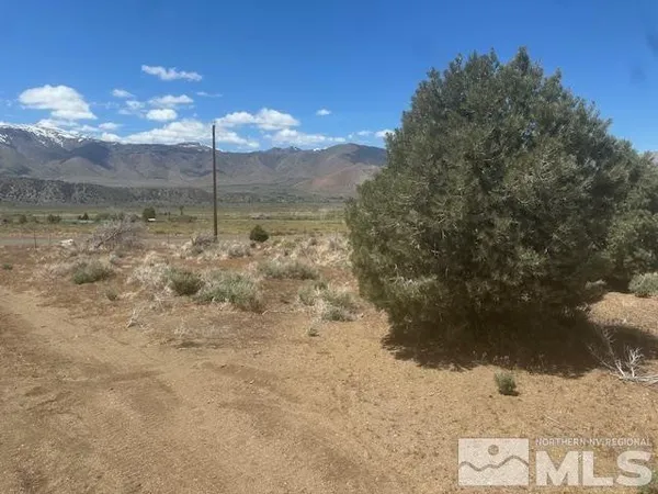 a view of mountain with sunset view