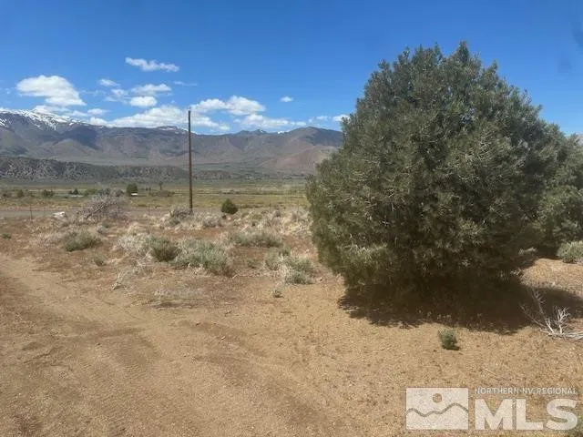 a view of mountain with sunset view