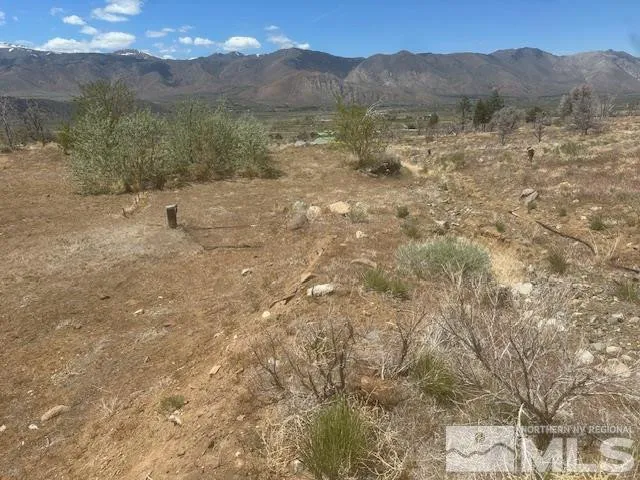a view of mountain with sunset view