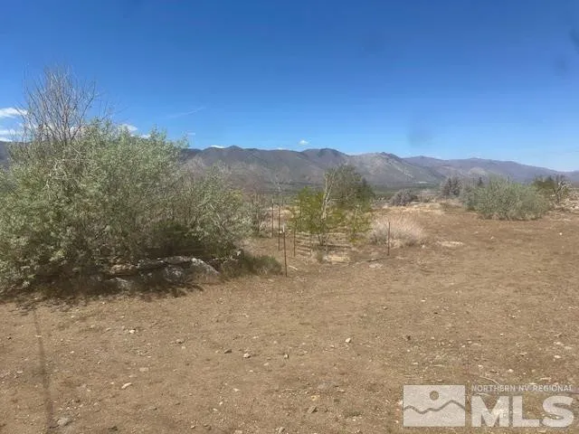 a view of an outdoor space with mountain view