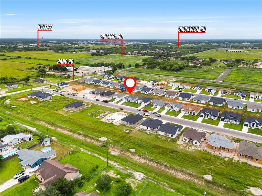 18054 Spruce Street Combes, TX 78552 - Photo 25 of 25 Aerial perspective showcasing a residential development with numerous single-story homes