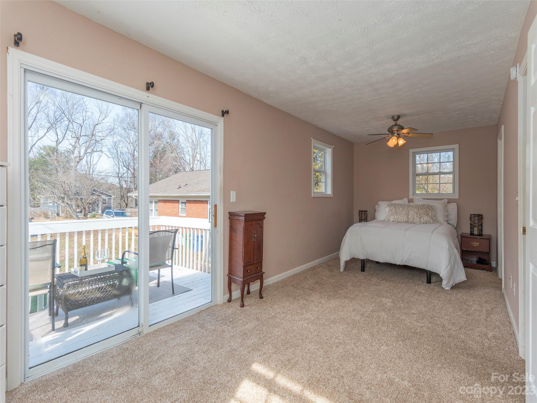 40 Laurel Loop Asheville, NC 28806 - Photo 14 of 26 a bedroom with a bed and a large window