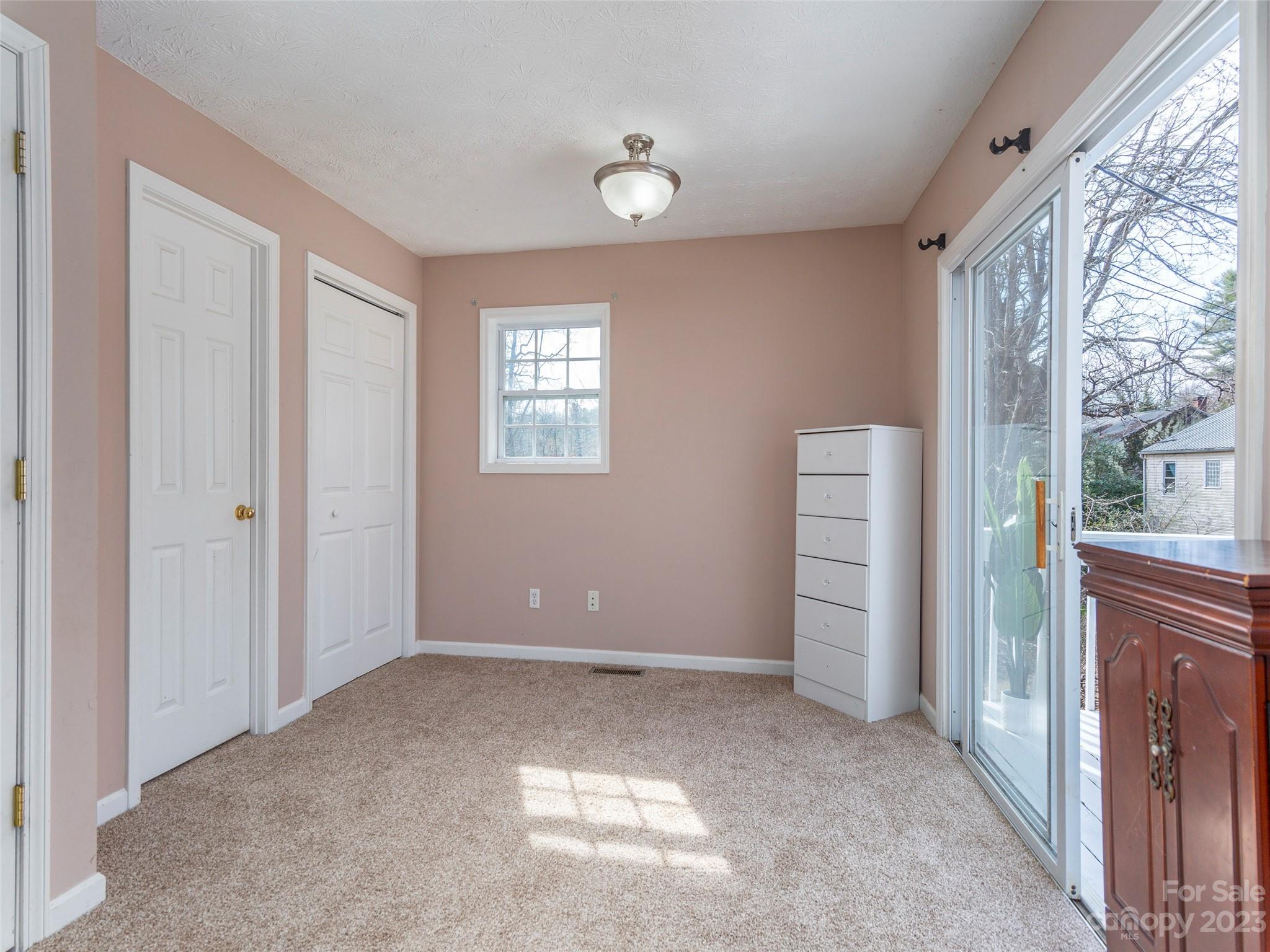 40 Laurel Loop Asheville, NC 28806 - Photo 17 of 26 an empty room with windows and closet