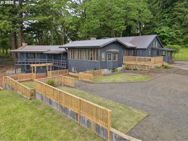 swimming pool view with a seating space