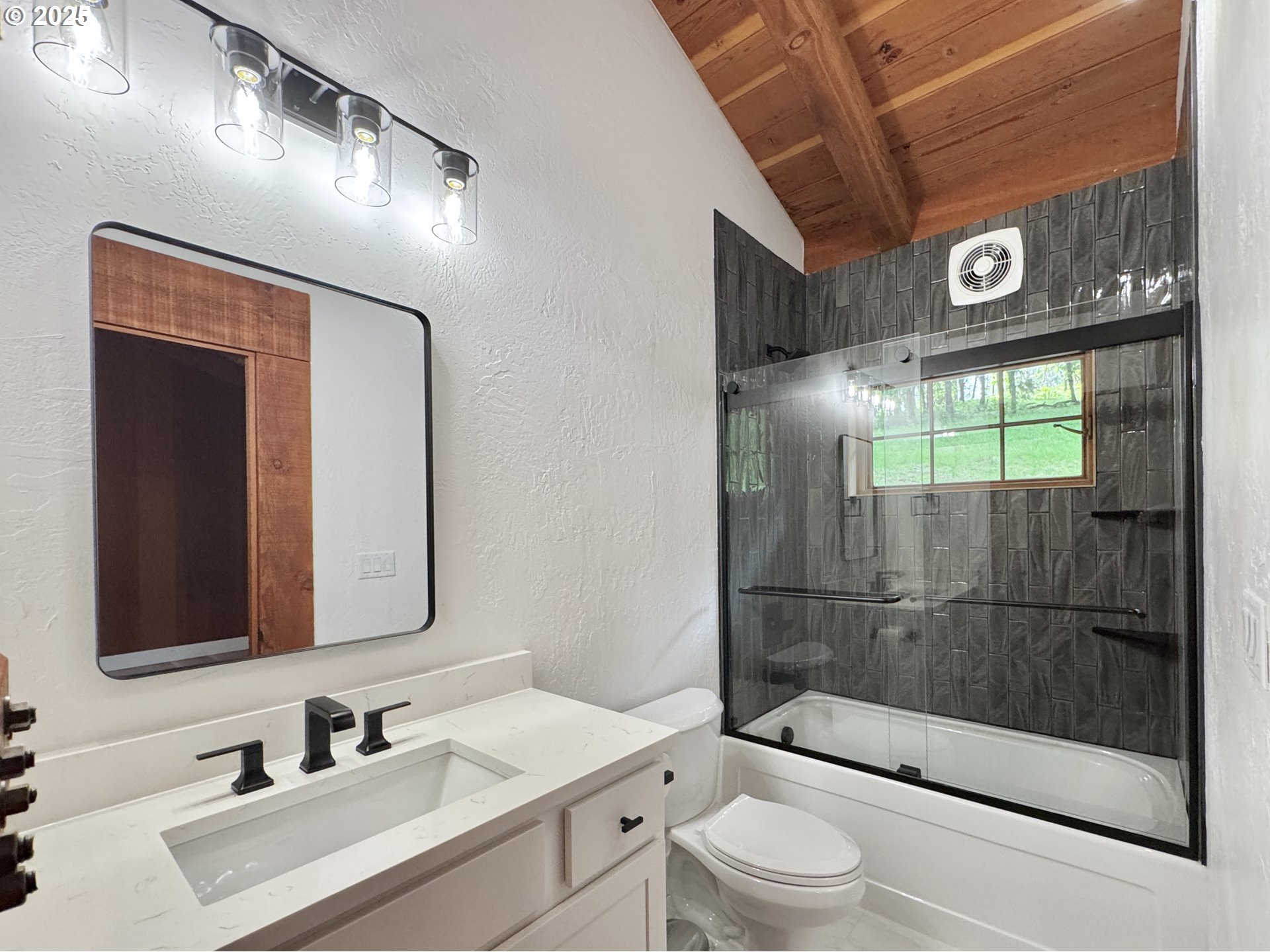 11890 Dupee Valley Road, Unit 1 Sheridan, OR 97378 - Photo 22 of 48 a bathroom with a sink a toilet and shower