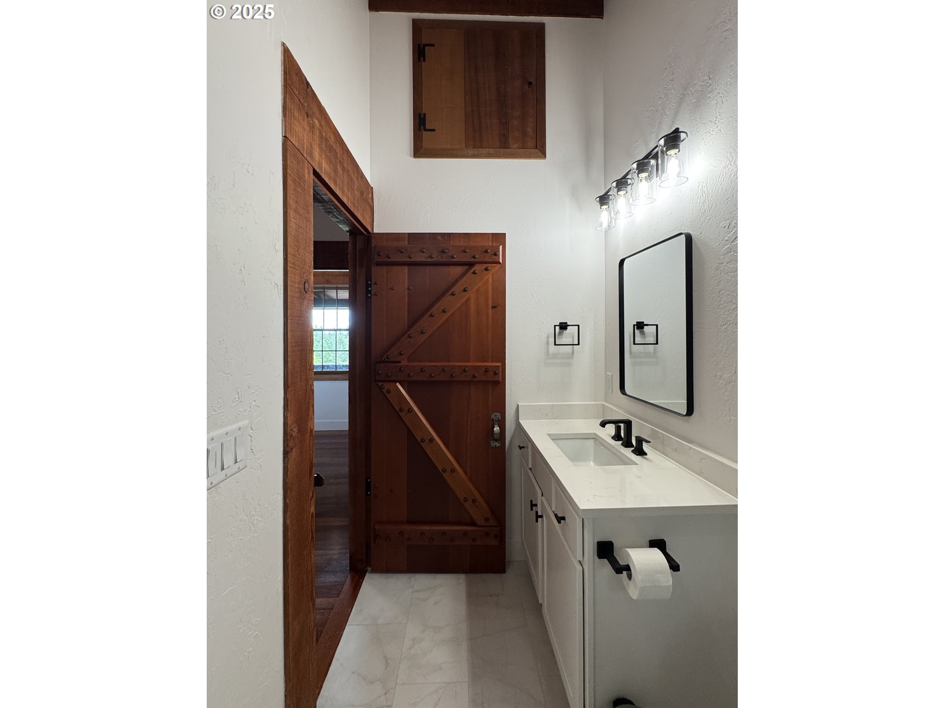 11890 Dupee Valley Road, Unit 1 Sheridan, OR 97378 - Photo 23 of 48 a bathroom with a sink and a mirror